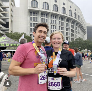 Rory and Michelle at Tiger 10K - 20wks along on 4 Dec 2022